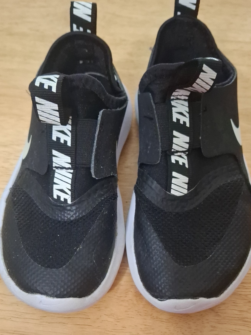 Nike Kids Black and White Slip-On Sneakers